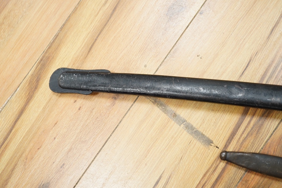 A First World War Turkish army officer’s sword, with pipe back blade, regulation iron guard pierced with crescent and moon, chequered horn grips, in its iron scabbard, together with an unidentified bayonet in its scabbar